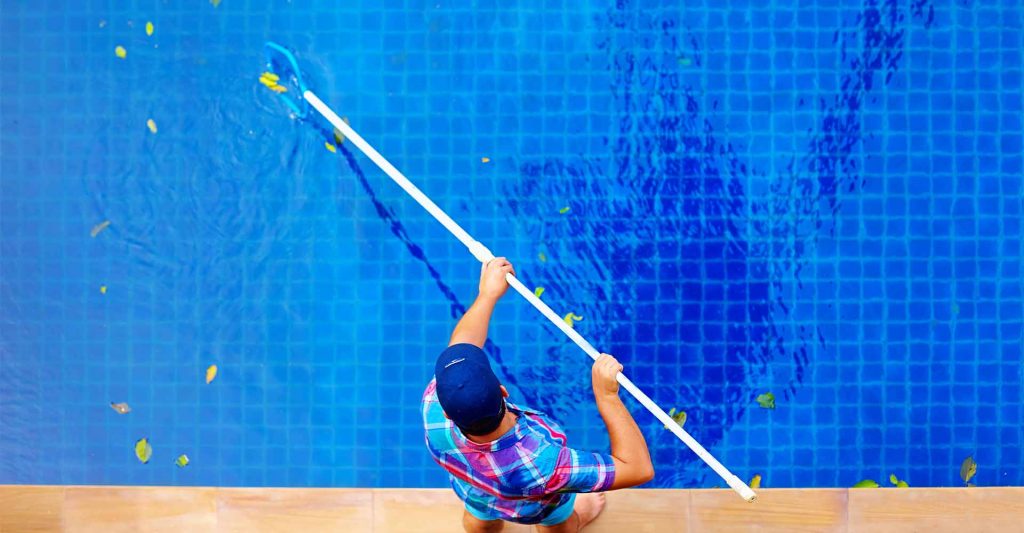 man-cleaning-pool